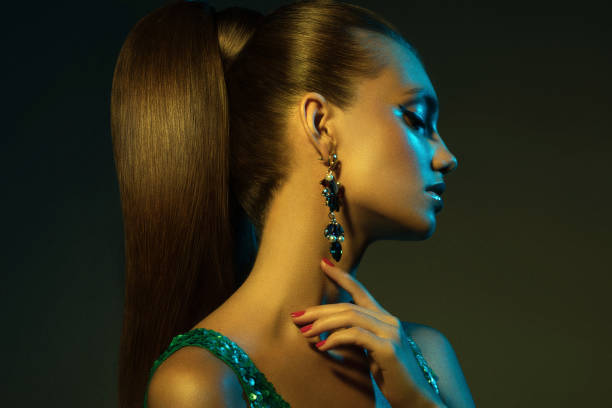 Young beautiful woman with earings