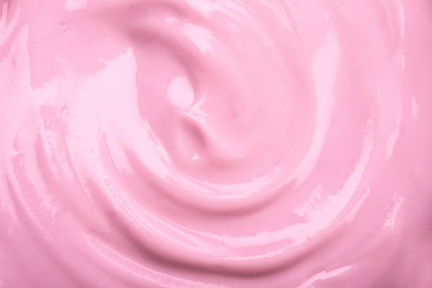 close up the pink creamy homemade blueberries or strawberries yogurt texture background stock photo