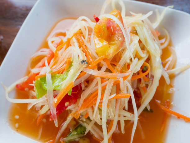 istock Pregnant papaya salad (Som tum Thai) 828574854