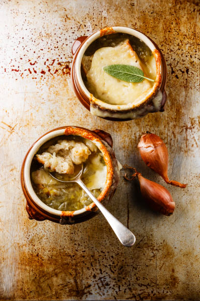 istock French Onion soup with dried bread and cheese in bowl 828582730