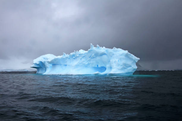 istock Beautiful iceberg or ice floe, Antarctic ocean 828583950