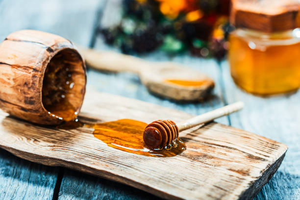 istock Honey on wood 828590354