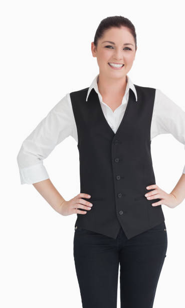 Woman in suit standing against the white background