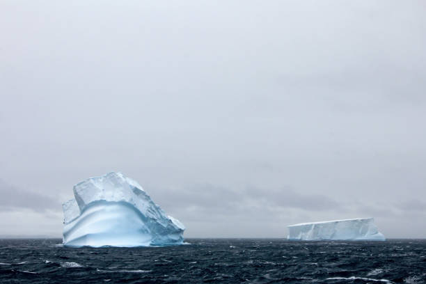 istock Beautiful iceberg or ice floe, Antarctic ocean 828606260