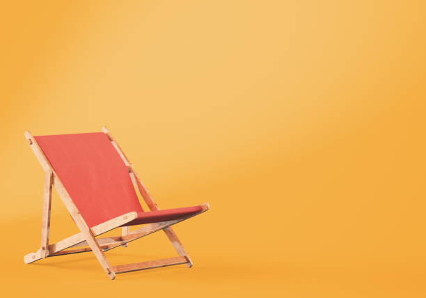 istock Wooden chaise lounge on orange background 828607926