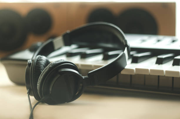 istock headphones are on the synthesizer 828648488
