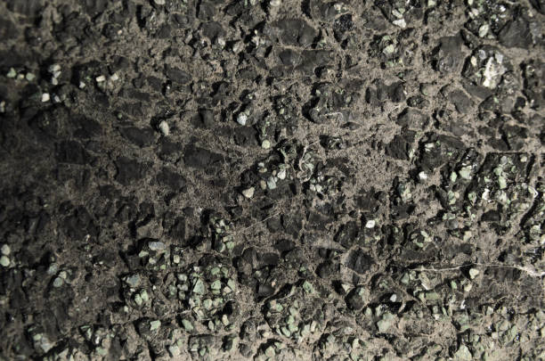 istock green pebbles in black resin 828662120