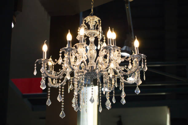 istock Beautiful chandelier. luxury expensive chandelier hanging under ceiling 828663122