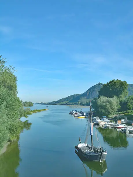 View from Grafenwerth Island at Rhine River in Bad Honnef to famous Drachenfels,Siebengebirge,Germany
