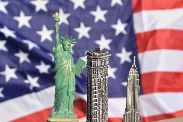 istock Statue of Liberty, Flatiron Building, Empire State Building with US Flag 828675646
