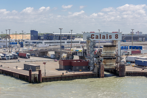 HARBOR CALAIS, FRANCE - JUNE 07, 2017: Port of Calais with trucks waiting for embarking at the ferry to Engeland