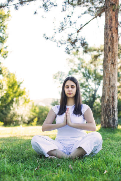 istock Beautiful girl doing yoga 828682776