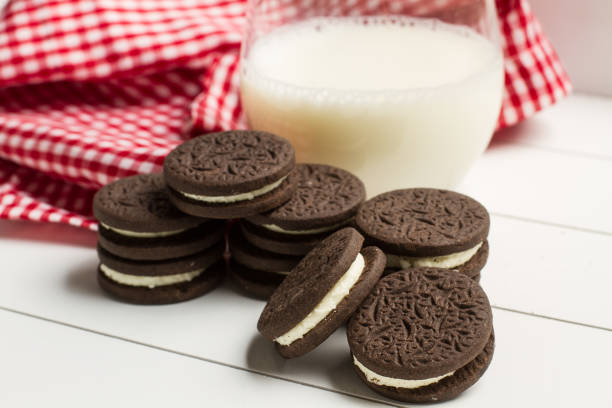 istock Cookies and a glass of milk 828704832