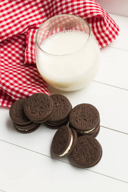 istock Cookies and a glass of milk 828704948