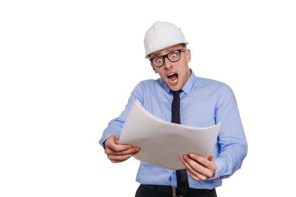 istock Architect engineer is horrified by the blueprint. Emotion concept. Isolated on white 828709026