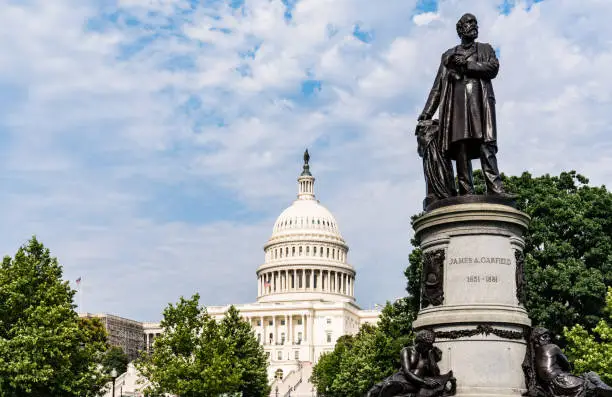 President James Garfield Monument with United States Capitol Building in Washington, DC