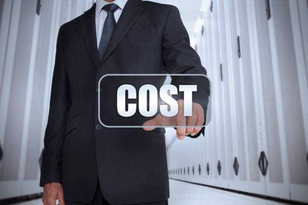 istock Businessman in a data center selecting label with cost 828714352