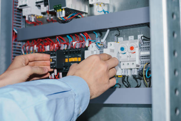 istock Electrician specialist checking low-voltage cabinet equipment 828732006