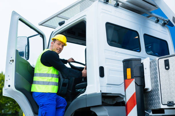 istock crane operator driving with truck of construction site 828739126