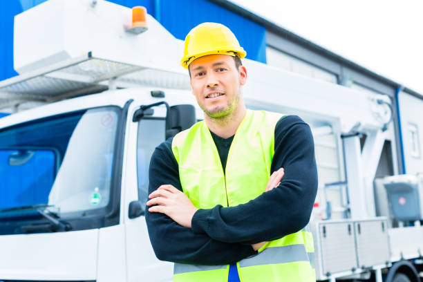 istock crane operator in front of truck on site 828746386