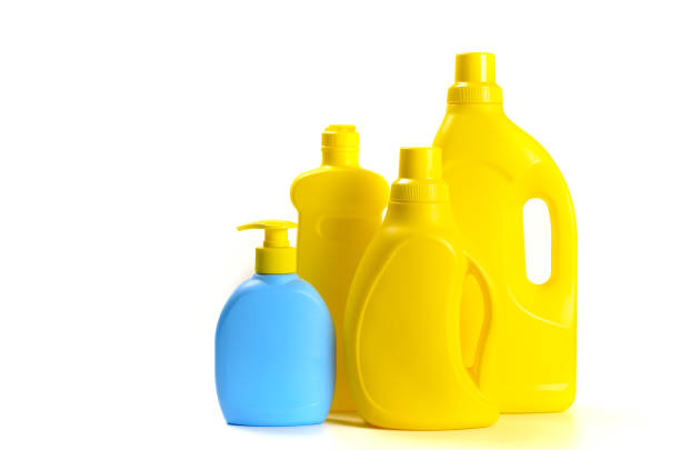 blank yellow and blue detergent bottles on white background