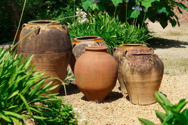 istock five empty Spanish flower pots in a patio 828785516