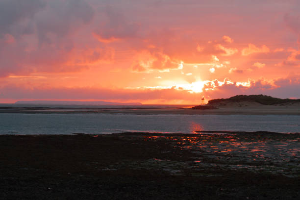 A dramatic sunset from the Bideford Bay Taw and Torridge river estuary.