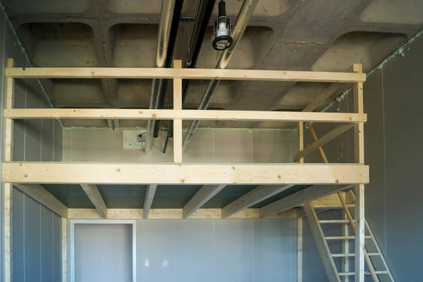 istock building a wooden high sleeper in an empty student room 828787988