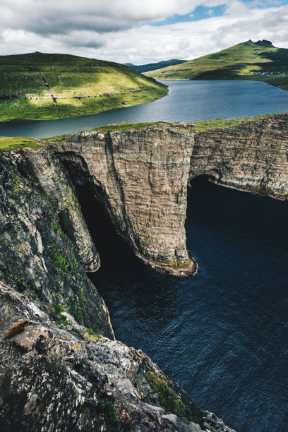 istock the amazing faroe landscape with high cliff 828803708
