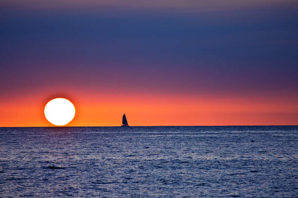 istock Sailboat Sailing at Sunset, Kailua-Kona, Hawaii 828825898