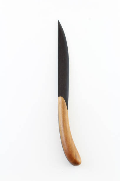 istock Dark wood letter opener with a light wood handle 828827882
