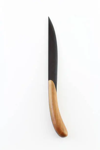 Photo of Dark wood letter opener with a light wood handle