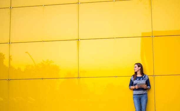 istock Woman holding digital tablet 828852448