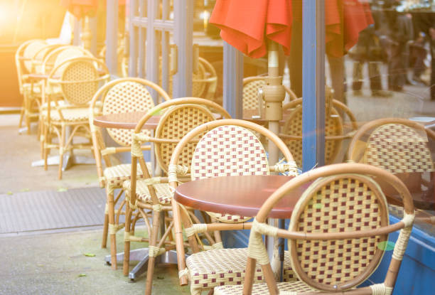 istock Row of Open Air Restaurant Tables in One Line Together 828861966