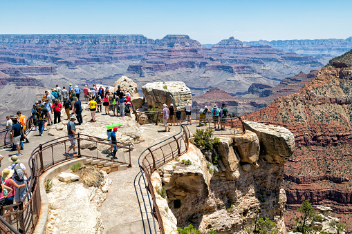 Tourists at viewpoint, South Rim, Grand Canyon National Park, Arizona, USA