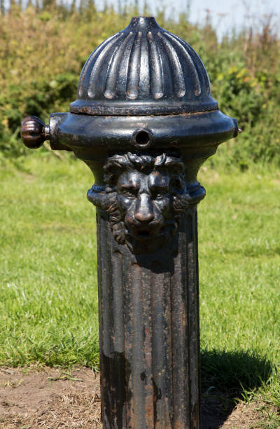 istock Old Iron Public Drinking Water Fountain 828904896