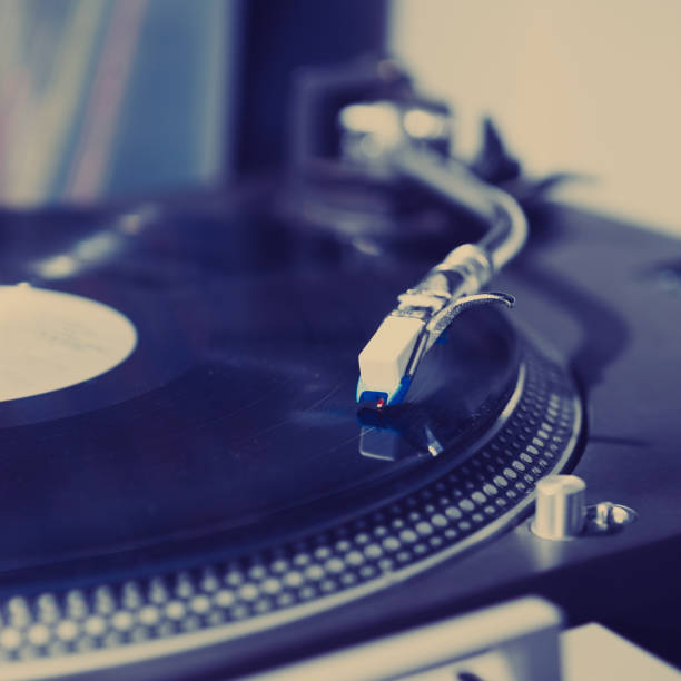 istock Disc jockey turntable record player playing music 828906668
