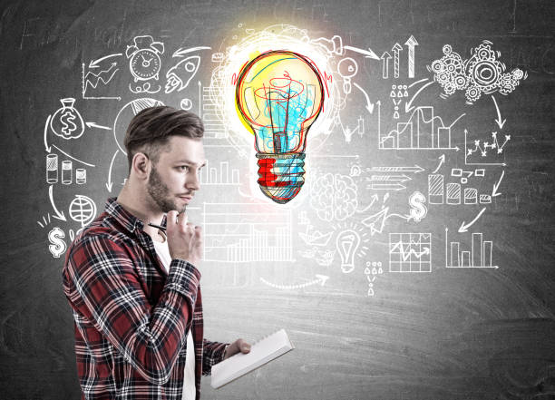 istock Bearded guy with a copybook and pen, good idea 828921778