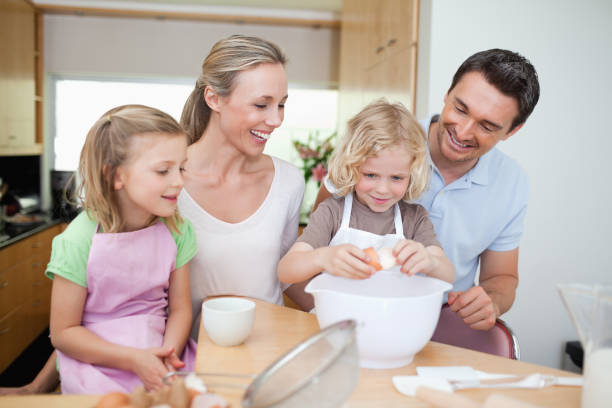 istock Family preparing cookies 828938136