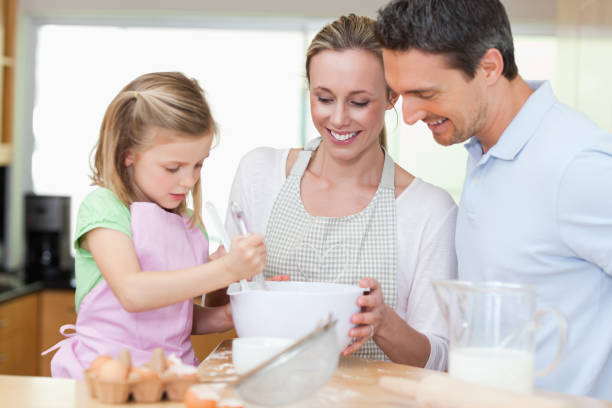 istock Family making cookies 828941312