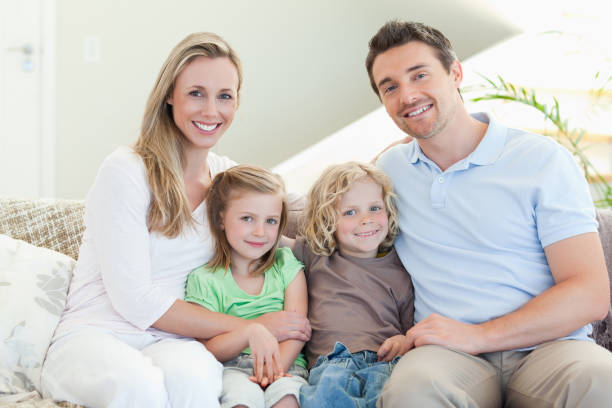 istock Happy family on the couch 828945798
