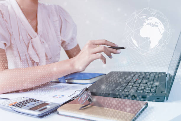 istock Asian Businessman using computer laptop showing trading graph beside the stock exchange trading graph screen laptop,Profit graph of stock market indicator.Business financial and forex concept 828953802