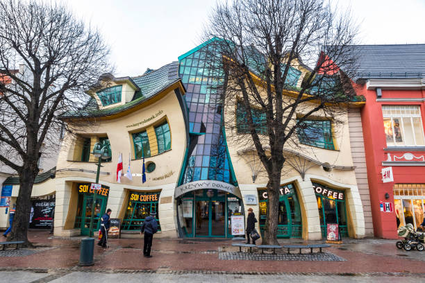 Crooked little house (Krzywy Domek) in Sopot, Poland Sopot: Crooked little house (Polish: "Krzywy Domek") is an unusually shaped building in Sopot, Poland. Built in 2004, it's part of the Rezydent shopping center gdansk photos stock pictures, royalty-free photos & images