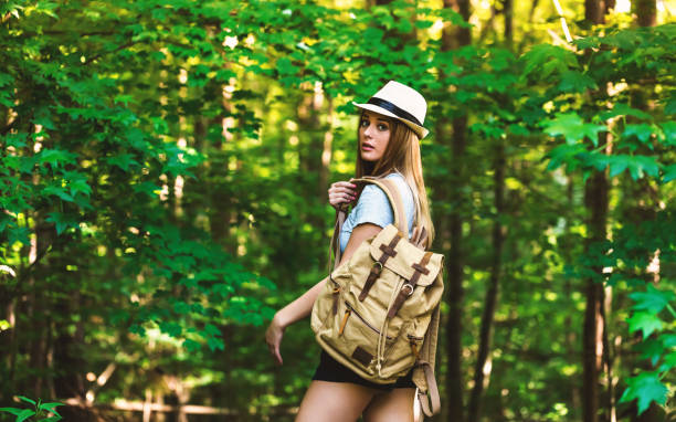 istock Young woman in the woods 828979758