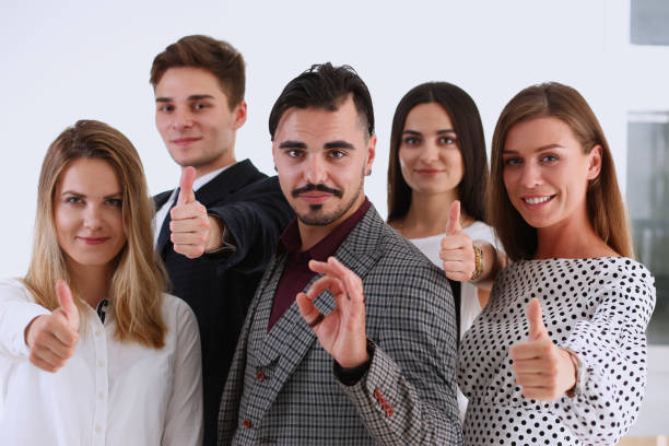 istock Teamwork business concept group people ok finger 829005024