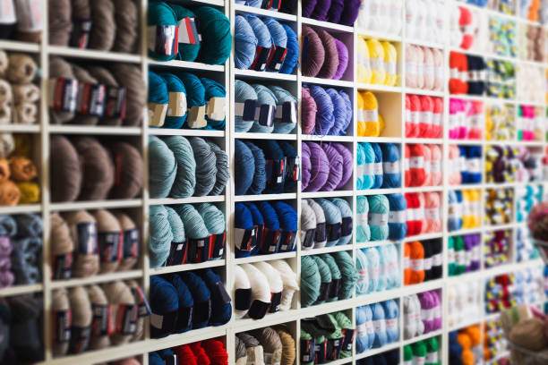 istock Shelves with colorful wool and yarn 829006586