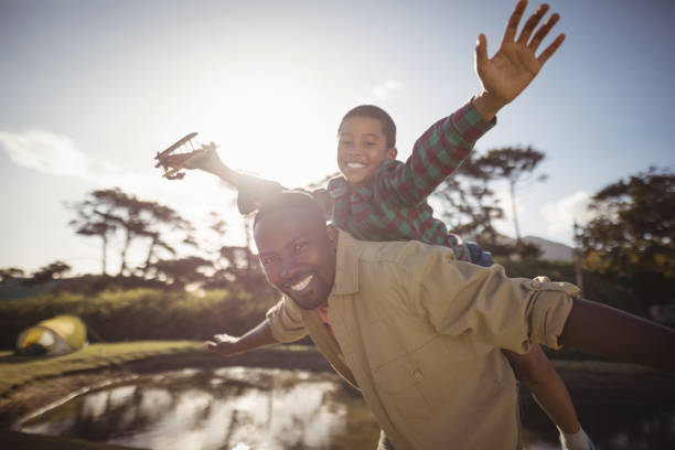 istock Father and son playing in the park 829030720