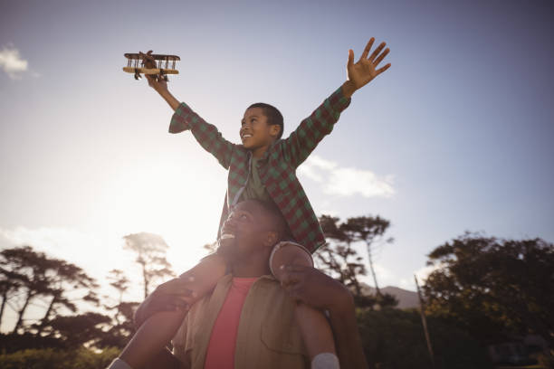 istock Father and son playing in the park 829031402