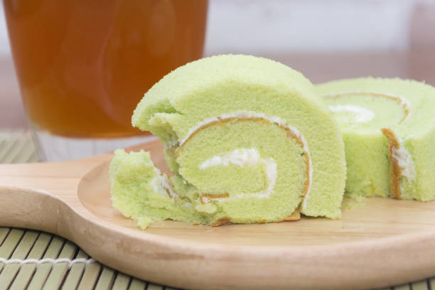 istock slice of pandan roll cake and jasmine tea 829114048