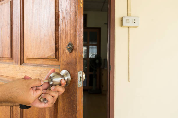 istock locksmith open the wood door by ghost key 829114184